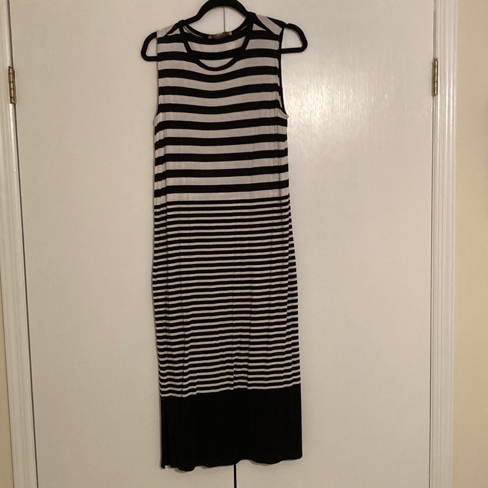 Sleeveless multi stripe dress perfect for layering with side slits